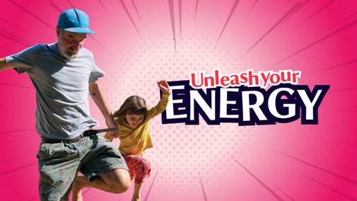 Adult and child jumping together on a pink background with the words “Unleash your Energy"